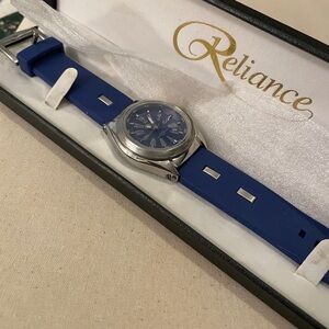 Reliance Croton blue Silicone Strap Watch with Silver Case
 New w box. Never use